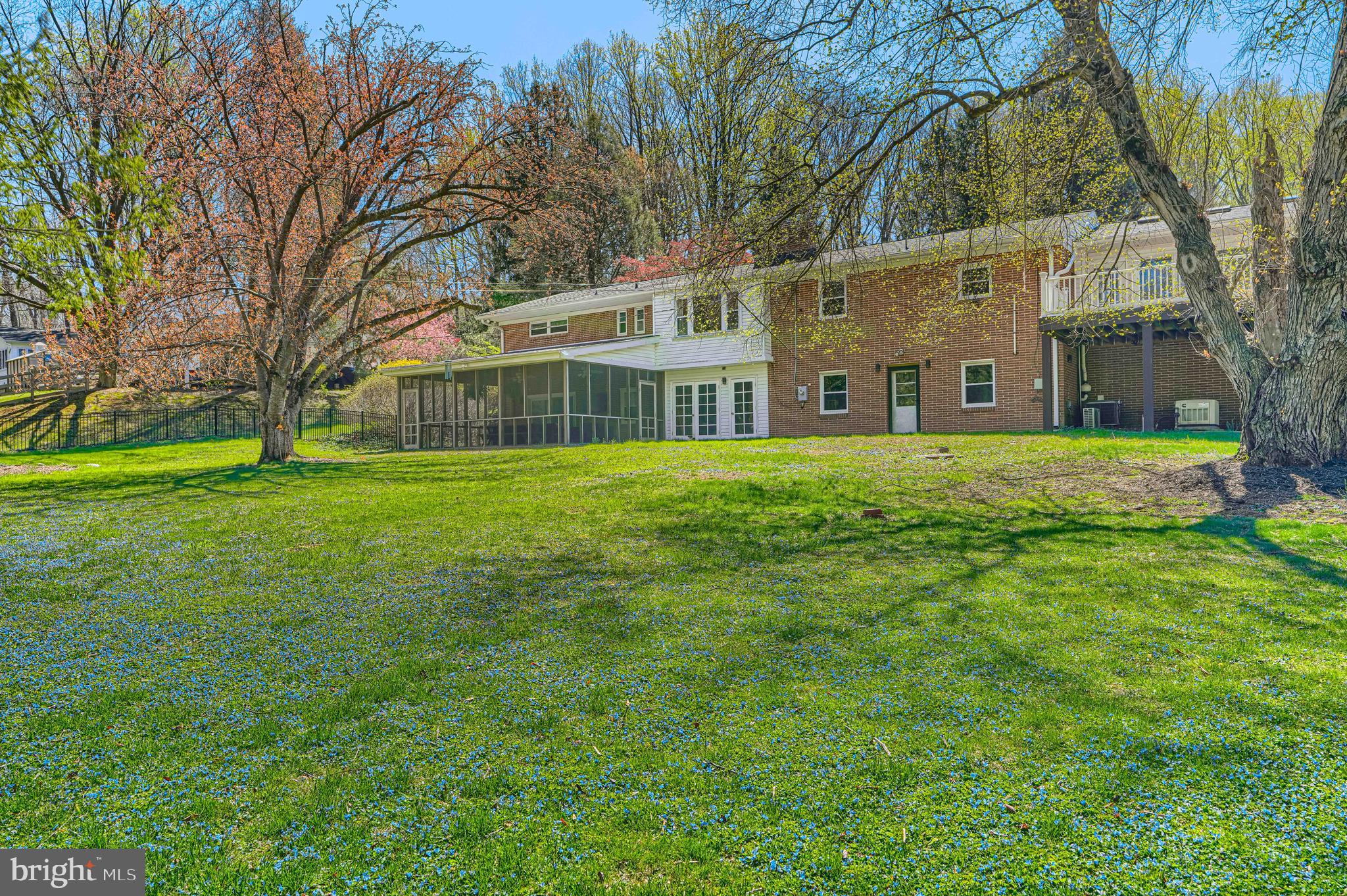 802 Stone Barn Road Towson, MD 21286 - Photo 101 of 104 a front view of a house with a garden