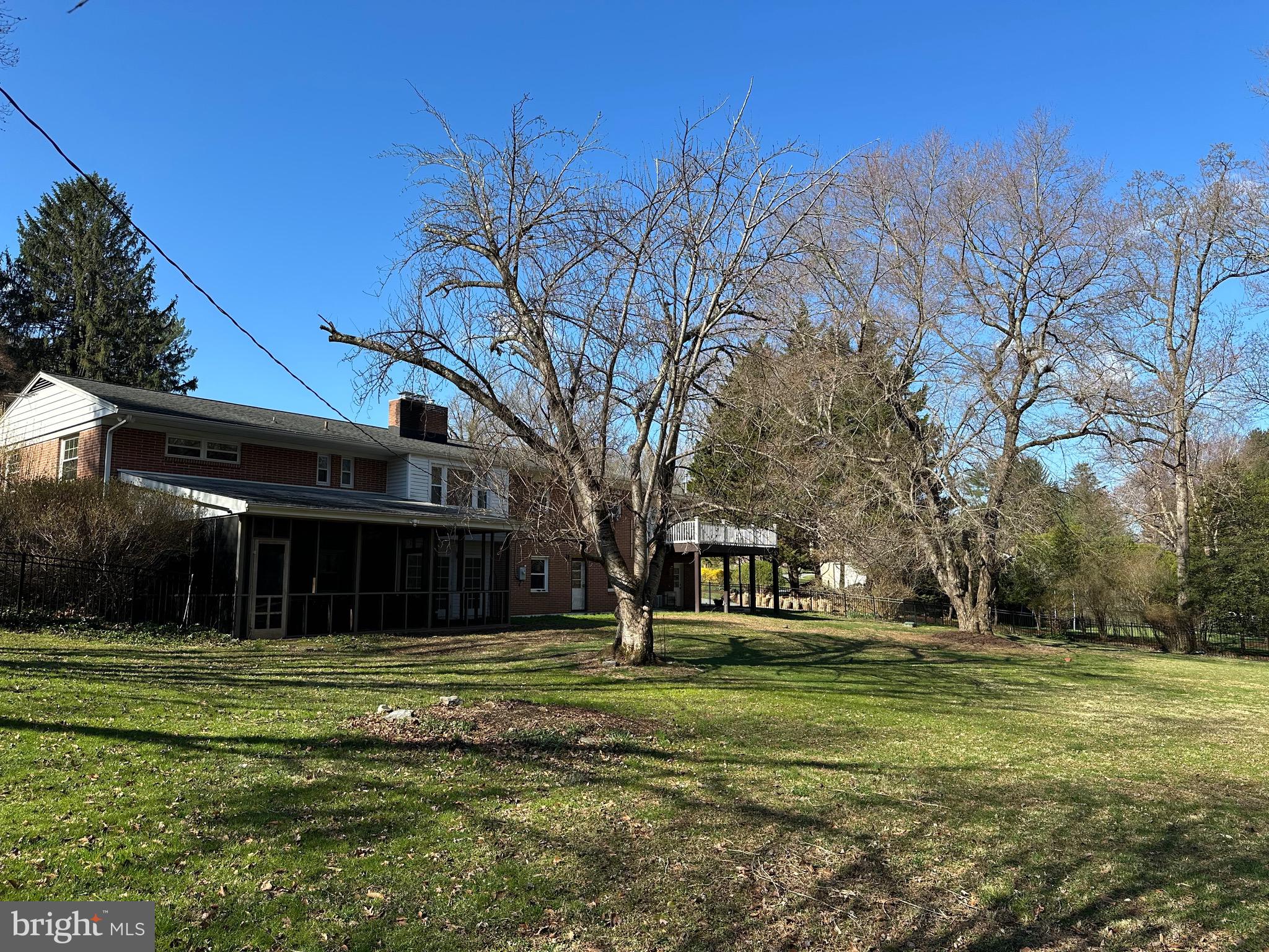 802 Stone Barn Road Towson, MD 21286 - Photo 28 of 104 a front view of a house with a yard