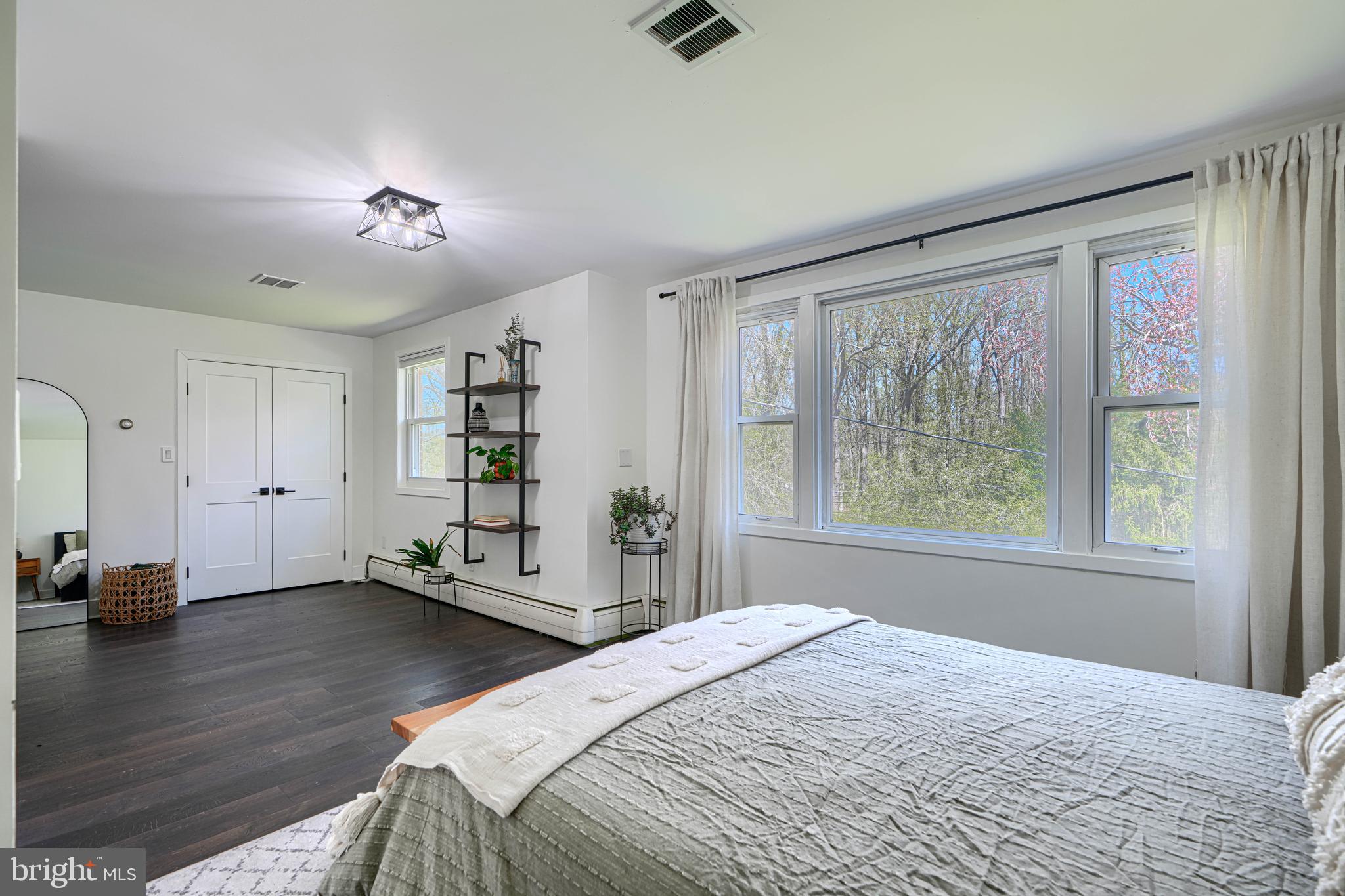 802 Stone Barn Road Towson, MD 21286 - Photo 56 of 104 a bedroom with a bed and a window