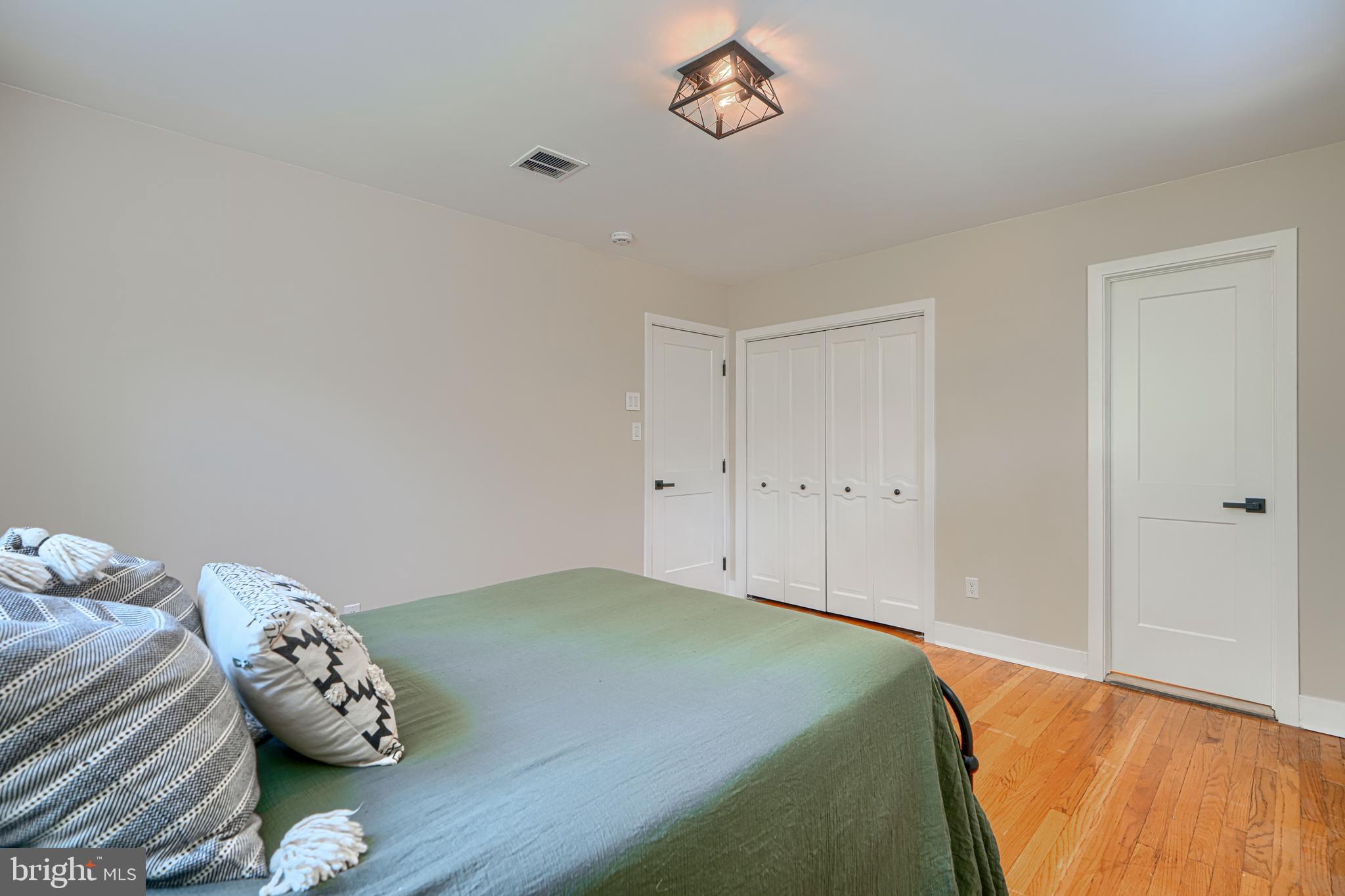 802 Stone Barn Road Towson, MD 21286 - Photo 67 of 104 a bedroom with a bed and a window