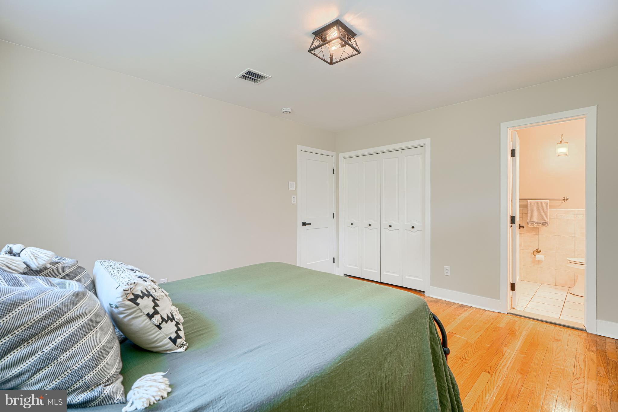 802 Stone Barn Road Towson, MD 21286 - Photo 68 of 104 a bedroom with a bed and a window