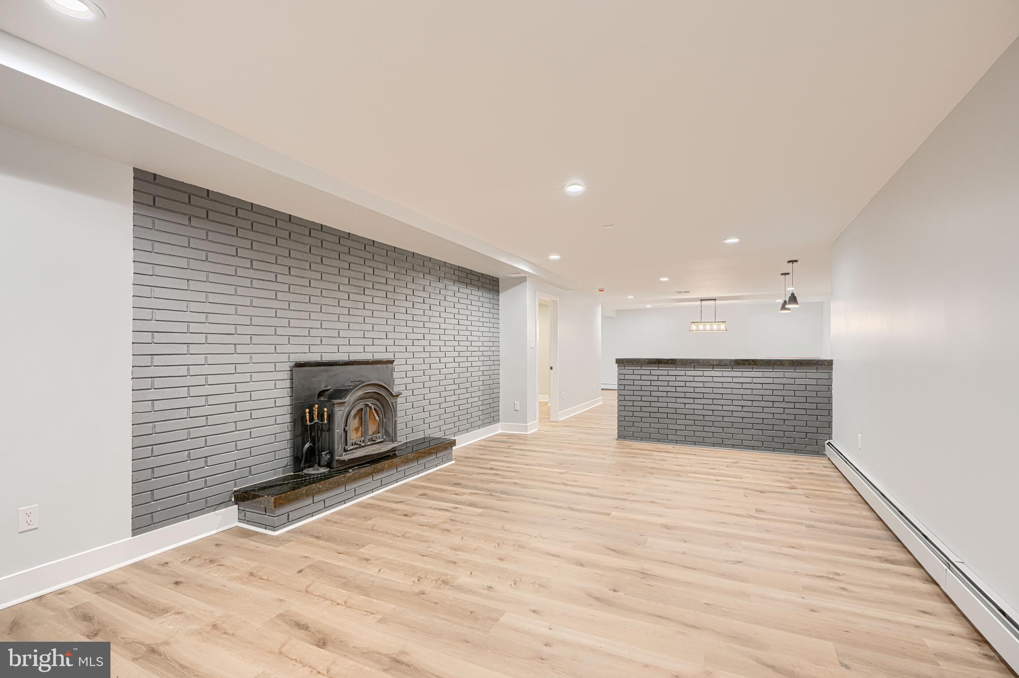 802 Stone Barn Road Towson, MD 21286 - Photo 73 of 104 a view of empty room with a fireplace