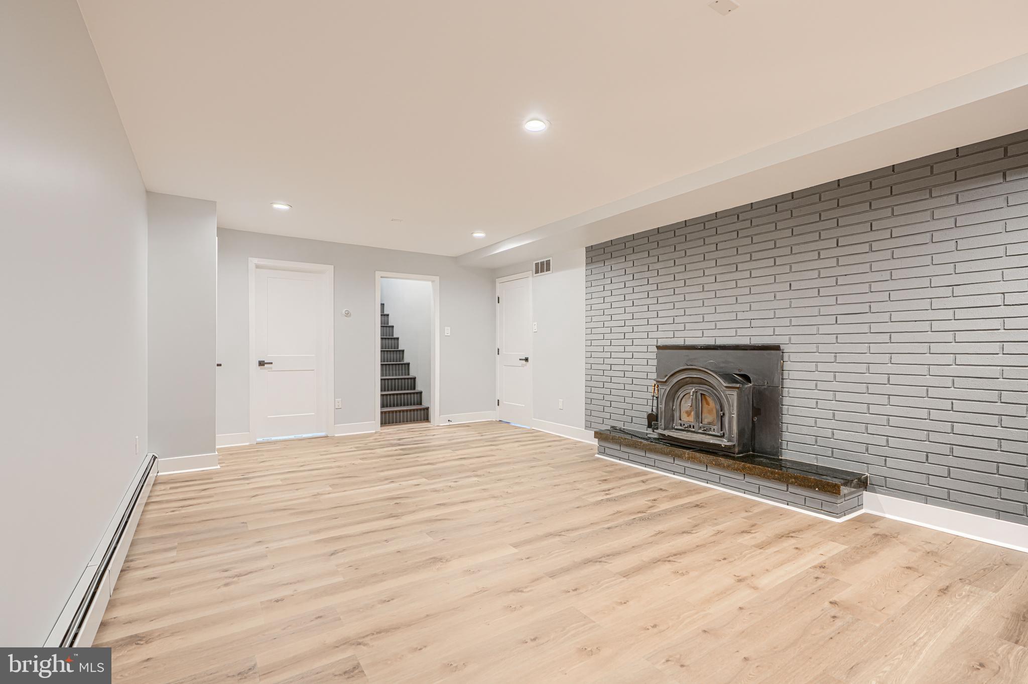 802 Stone Barn Road Towson, MD 21286 - Photo 75 of 104 a view of empty room with a fireplace