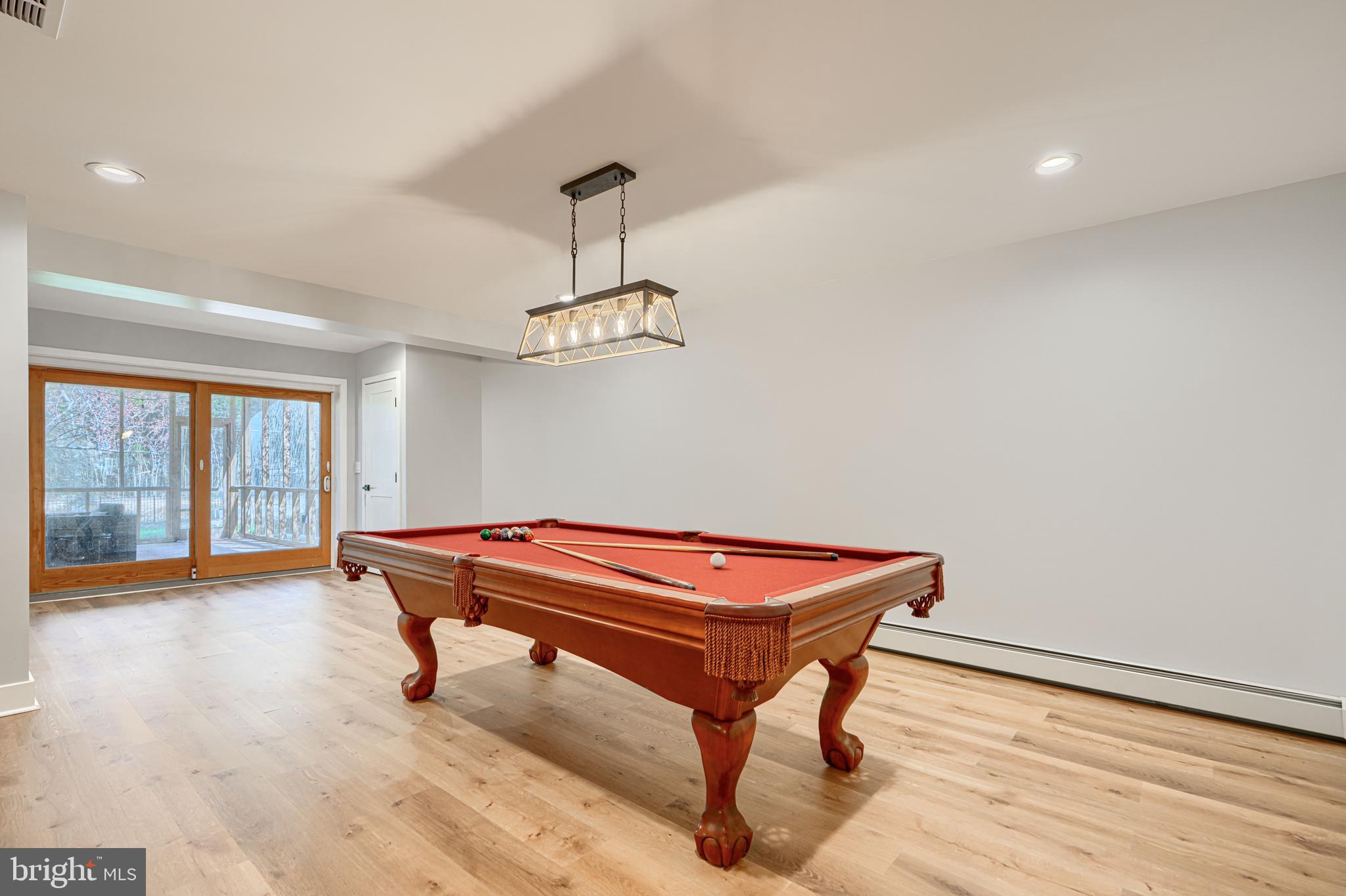 802 Stone Barn Road Towson, MD 21286 - Photo 79 of 104 a room with furniture pool table and wooden floor
