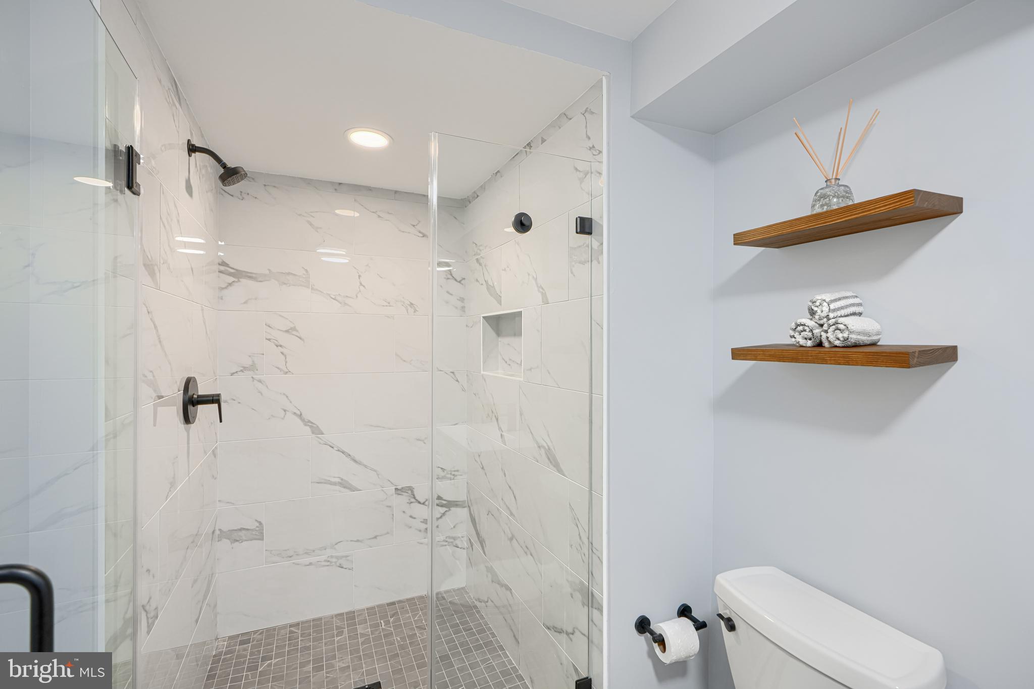 802 Stone Barn Road Towson, MD 21286 - Photo 88 of 104 a bathroom with a toilet and a shower