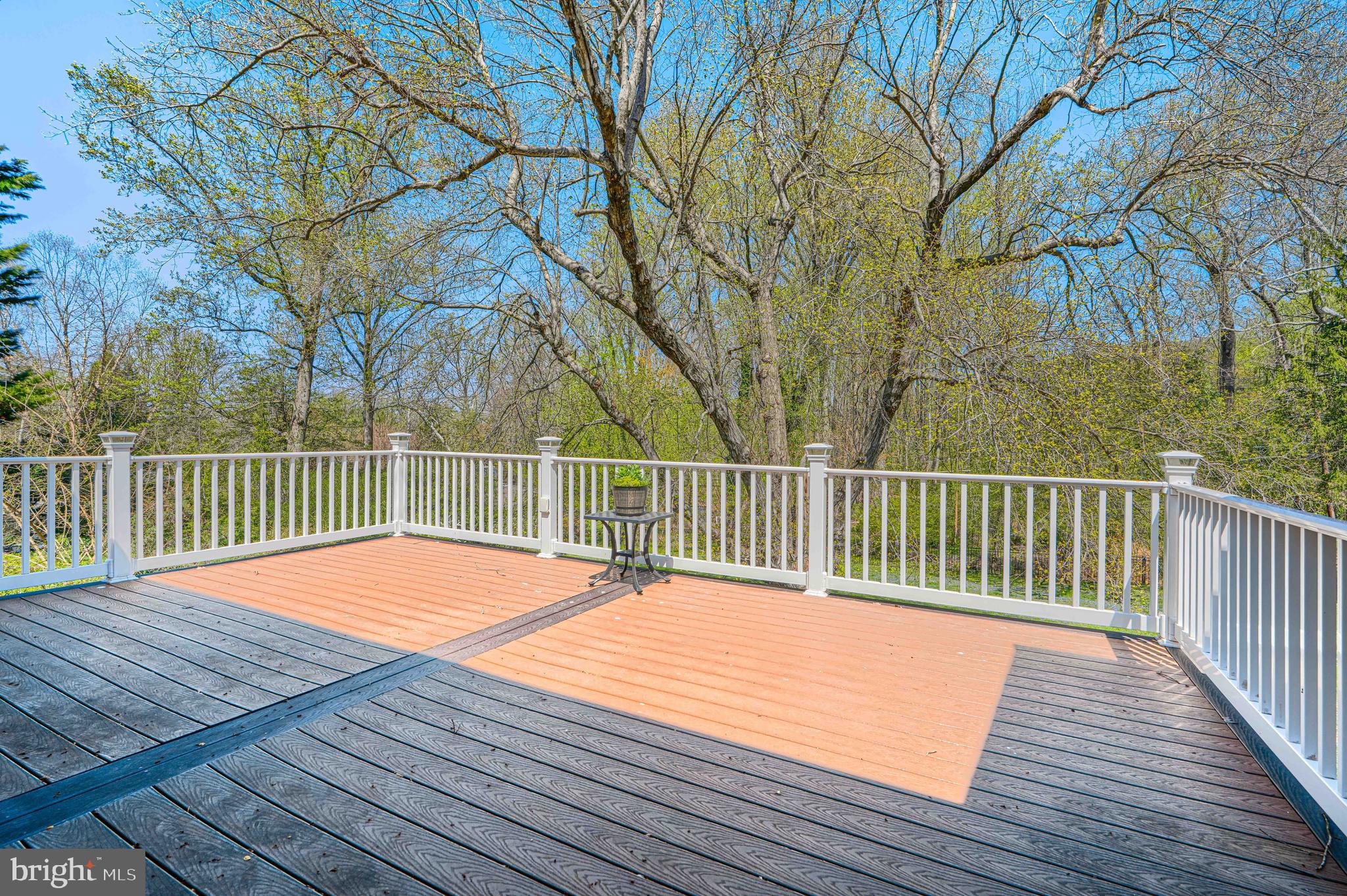 802 Stone Barn Road Towson, MD 21286 - Photo 95 of 104 a balcony with wooden floor and trees
