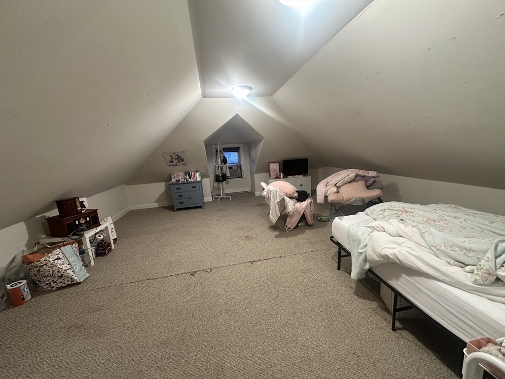 33 Iroquois Street, Unit 2 Boston, MA 02120 - Photo 9 of 14 a bedroom with two beds and painted walls