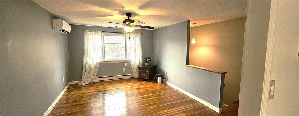 75 Garrison Road Chelmsford, MA 01824 - Photo 14 of 28 a view of a livingroom with a chandelier