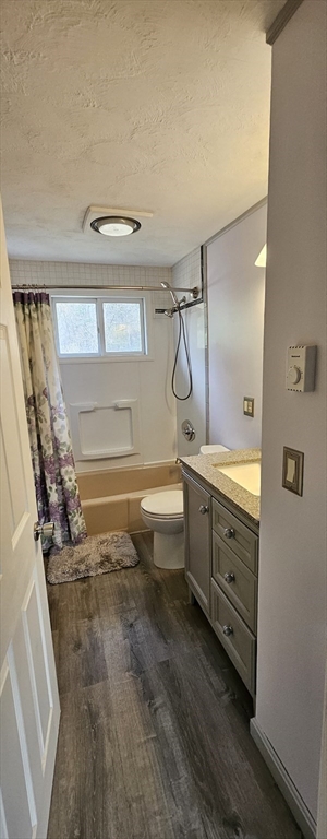 75 Garrison Road Chelmsford, MA 01824 - Photo 24 of 28 a bathroom with a granite countertop sink a toilet and shower