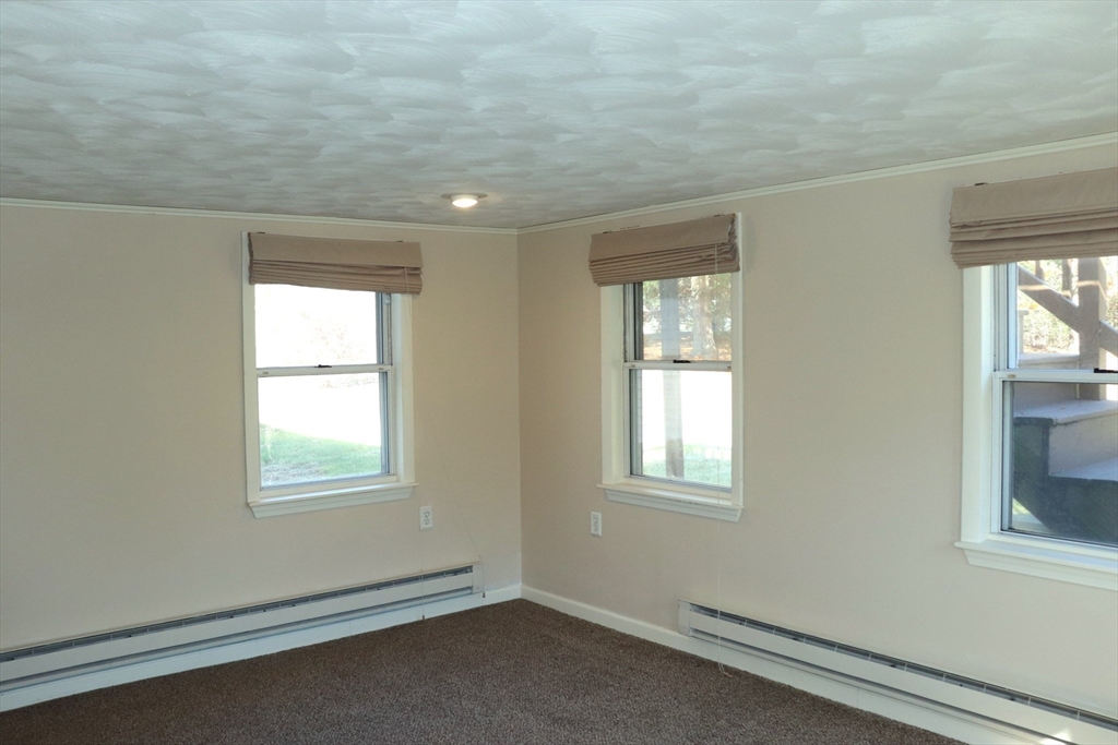 75 Garrison Road Chelmsford, MA 01824 - Photo 5 of 28 an empty room with windows