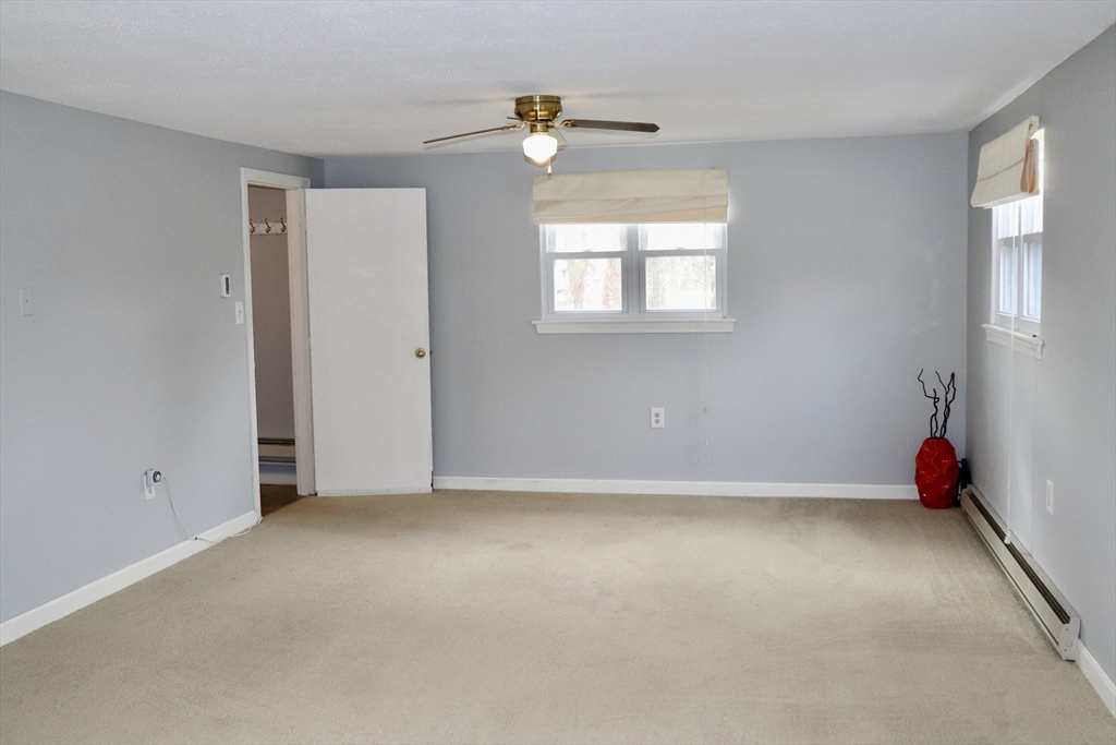 75 Garrison Road Chelmsford, MA 01824 - Photo 8 of 28 an empty room with a window