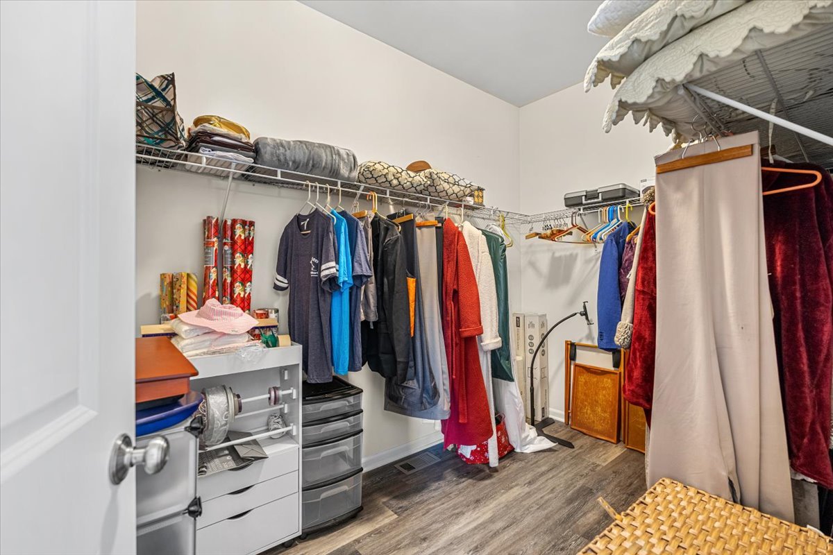 2220 Tyler Trail McHenry, IL 60051 - Photo 12 of 24 a view of walk in closet with clothes