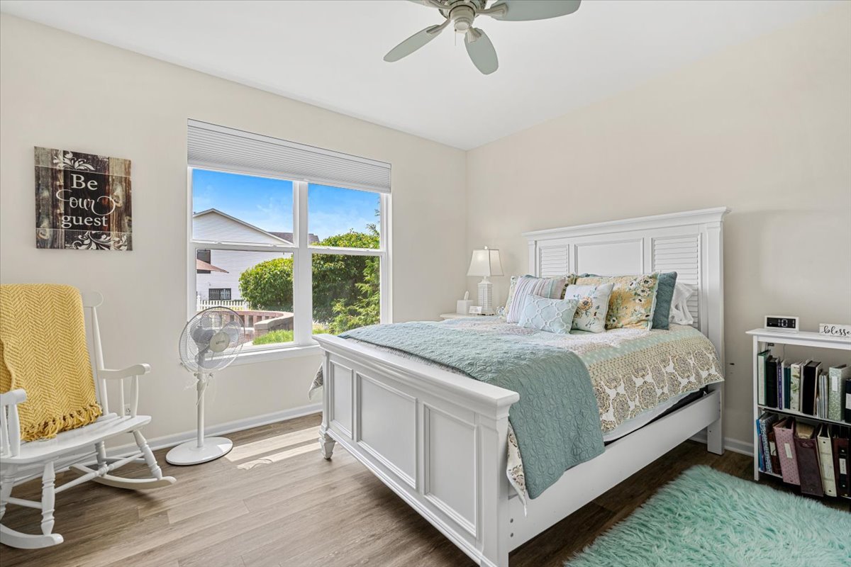 2220 Tyler Trail McHenry, IL 60051 - Photo 13 of 24 a bedroom with a bed and a desk in it