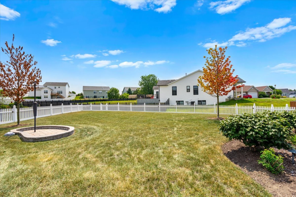 2220 Tyler Trail McHenry, IL 60051 - Photo 18 of 24 a swimming pool with outdoor seating and yard