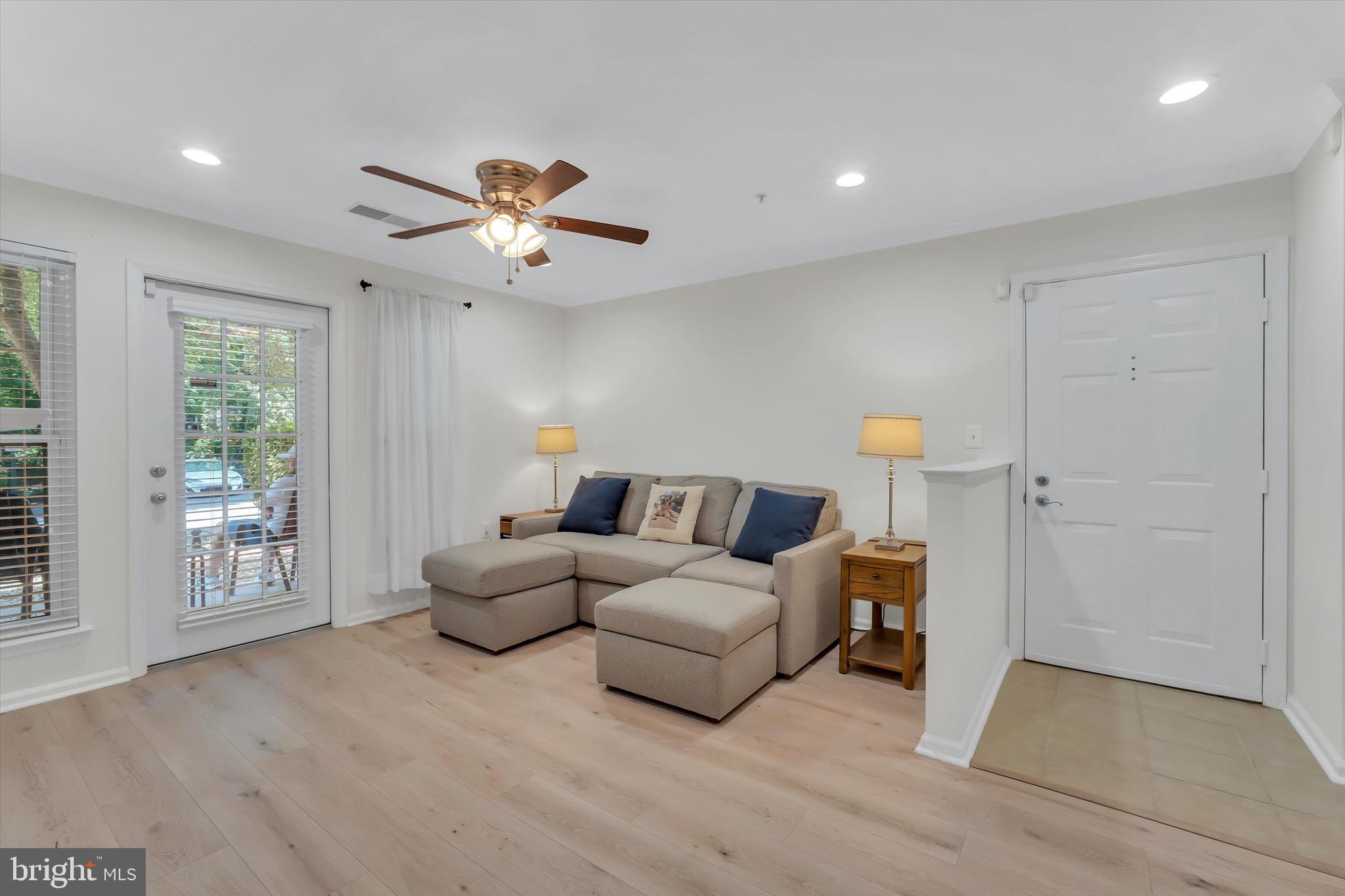 1516 North Point Drive, Unit 1 Reston, VA 20194 - Photo 12 of 32 Living Room with Patio Entrance
