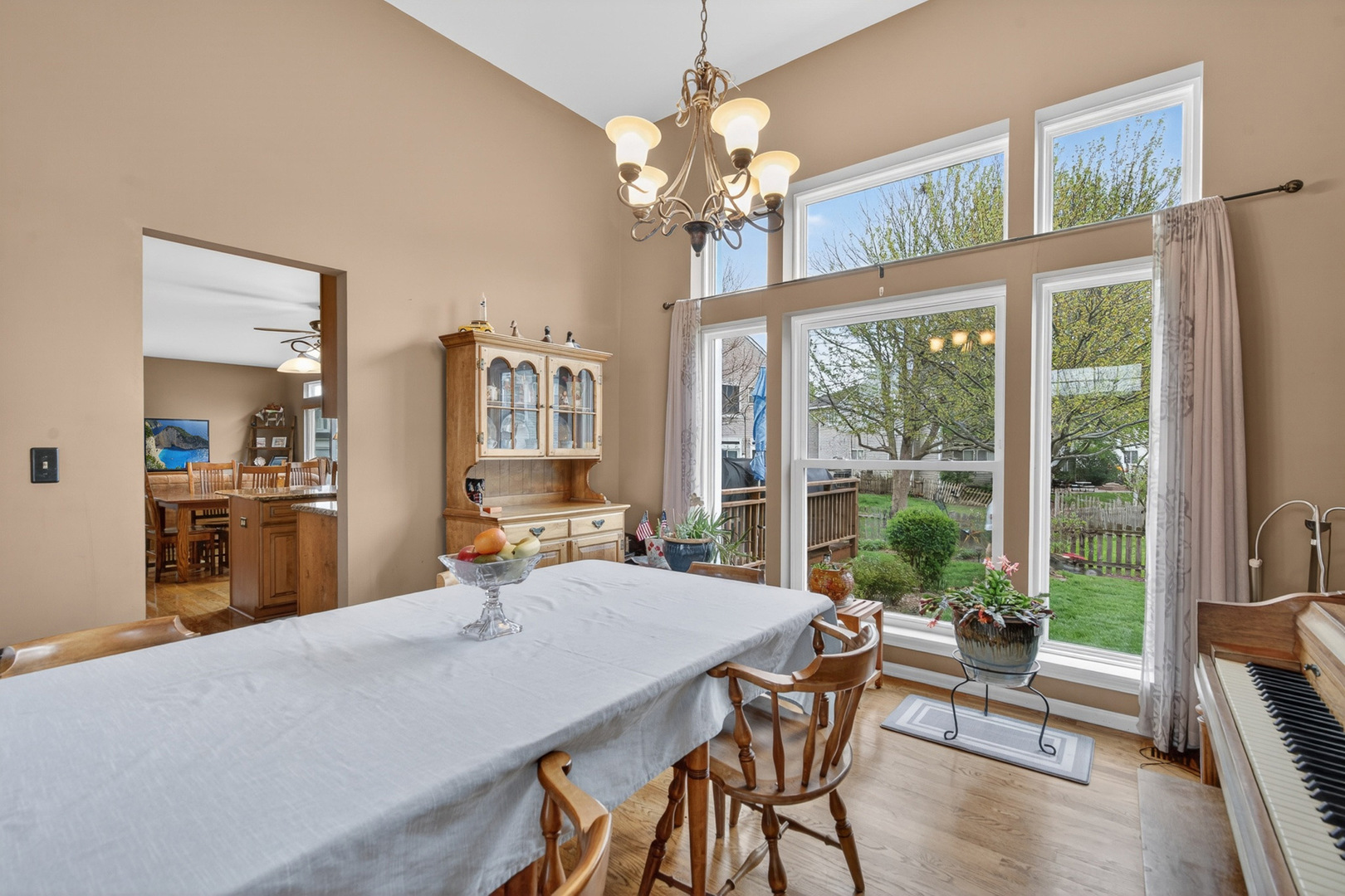 1160 Heavens Gate Lake In The Hills, IL 60156 - Photo 13 of 49 a dining room with a large window table and chairs