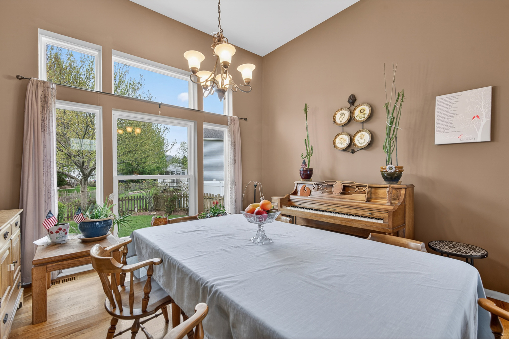 1160 Heavens Gate Lake In The Hills, IL 60156 - Photo 14 of 49 a living room with dining table and a large window