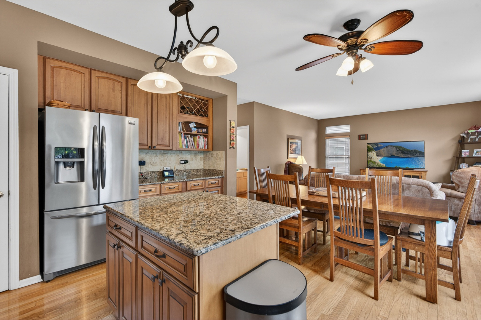 1160 Heavens Gate Lake In The Hills, IL 60156 - Photo 19 of 49 a kitchen that has a table chairs and refrigerator