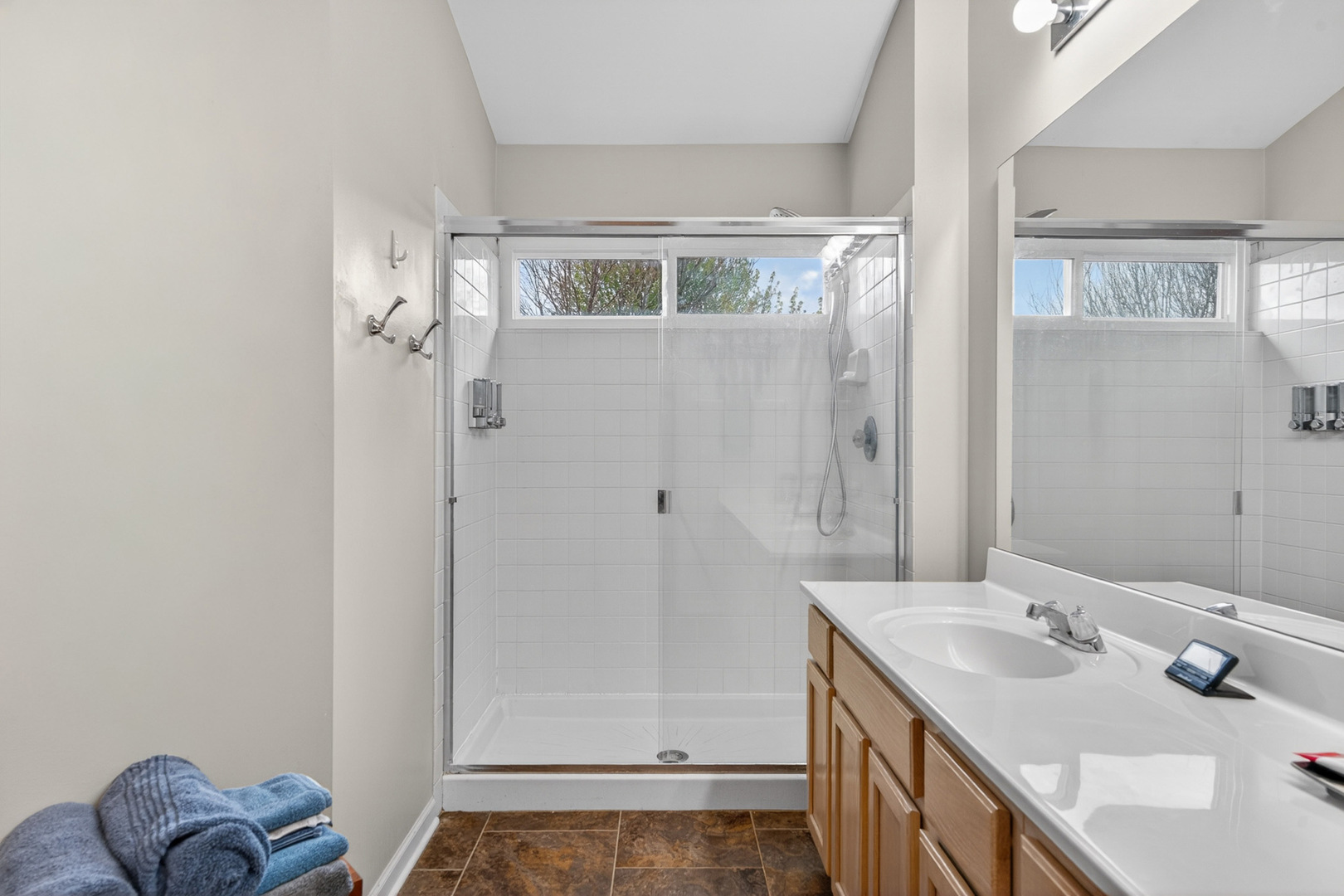 1160 Heavens Gate Lake In The Hills, IL 60156 - Photo 36 of 49 a bathroom with a sink a mirror and a shower
