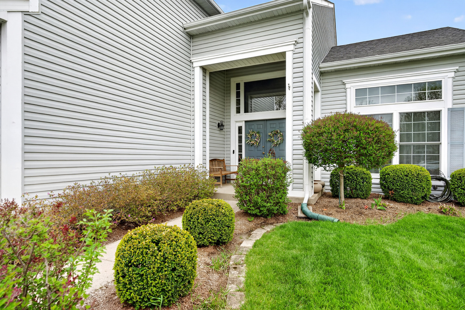 1160 Heavens Gate Lake In The Hills, IL 60156 - Photo 5 of 49 a view of a house with backyard and a garden