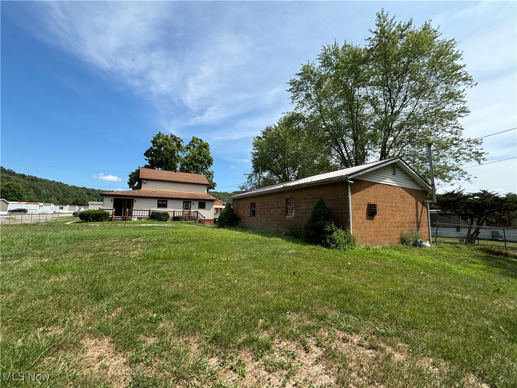 5164 Rutledge Street Southeast Dennison, OH 44621 - Photo 3 of 14 Back of property with a yard