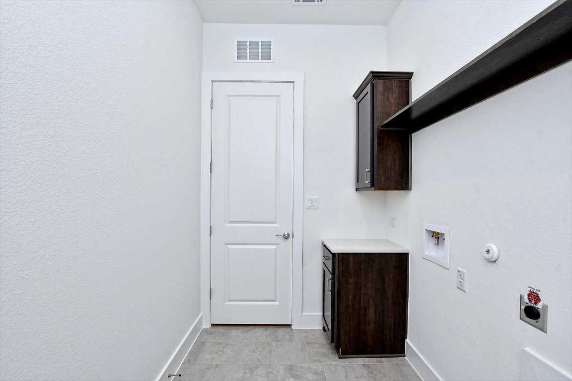 4828 Destination Way Jonestown, TX 78645 - Photo 13 of 33 a view of an entryway with hallway