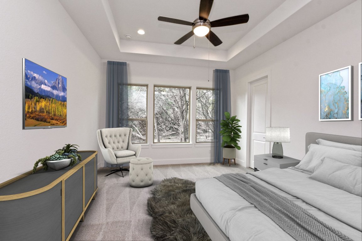 4828 Destination Way Jonestown, TX 78645 - Photo 15 of 33 a spacious bedroom with a bed and a chandelier