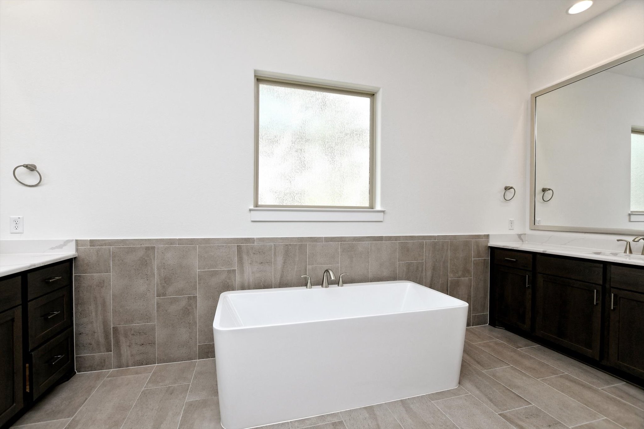 4828 Destination Way Jonestown, TX 78645 - Photo 21 of 33 a bathroom with a bathtub and a sink