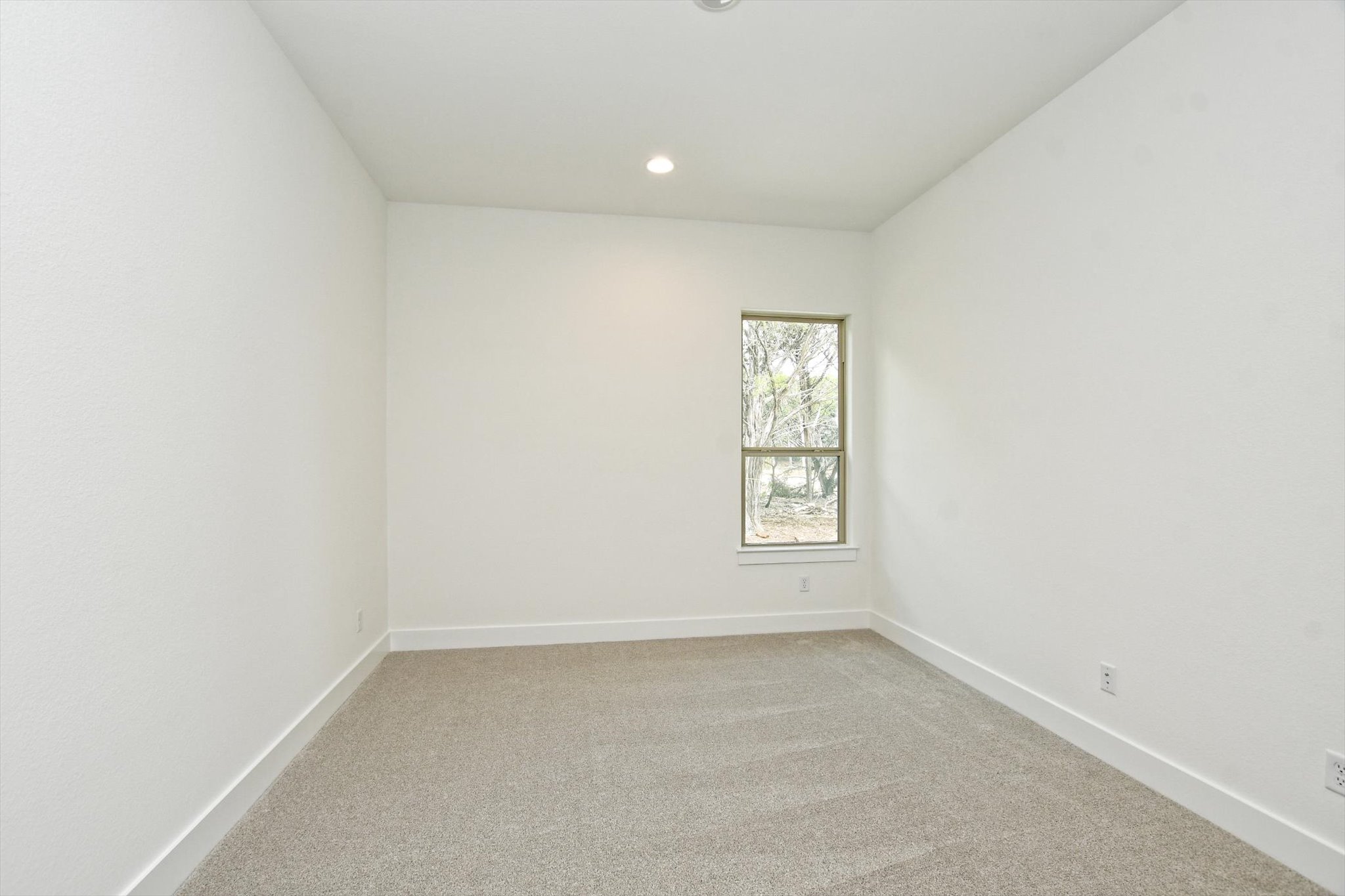 4828 Destination Way Jonestown, TX 78645 - Photo 27 of 33 an empty room with a window