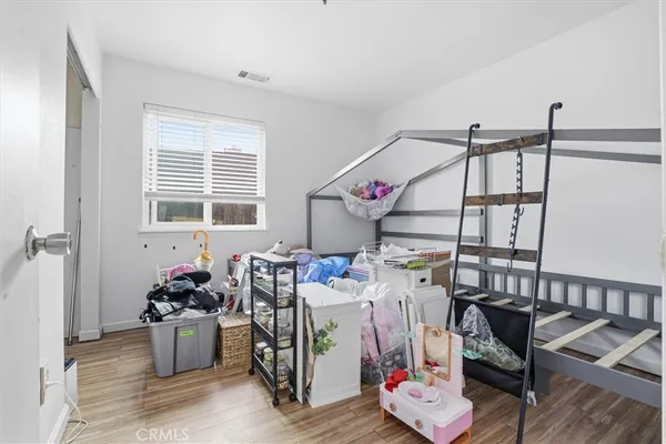 a storage room with furniture and a window