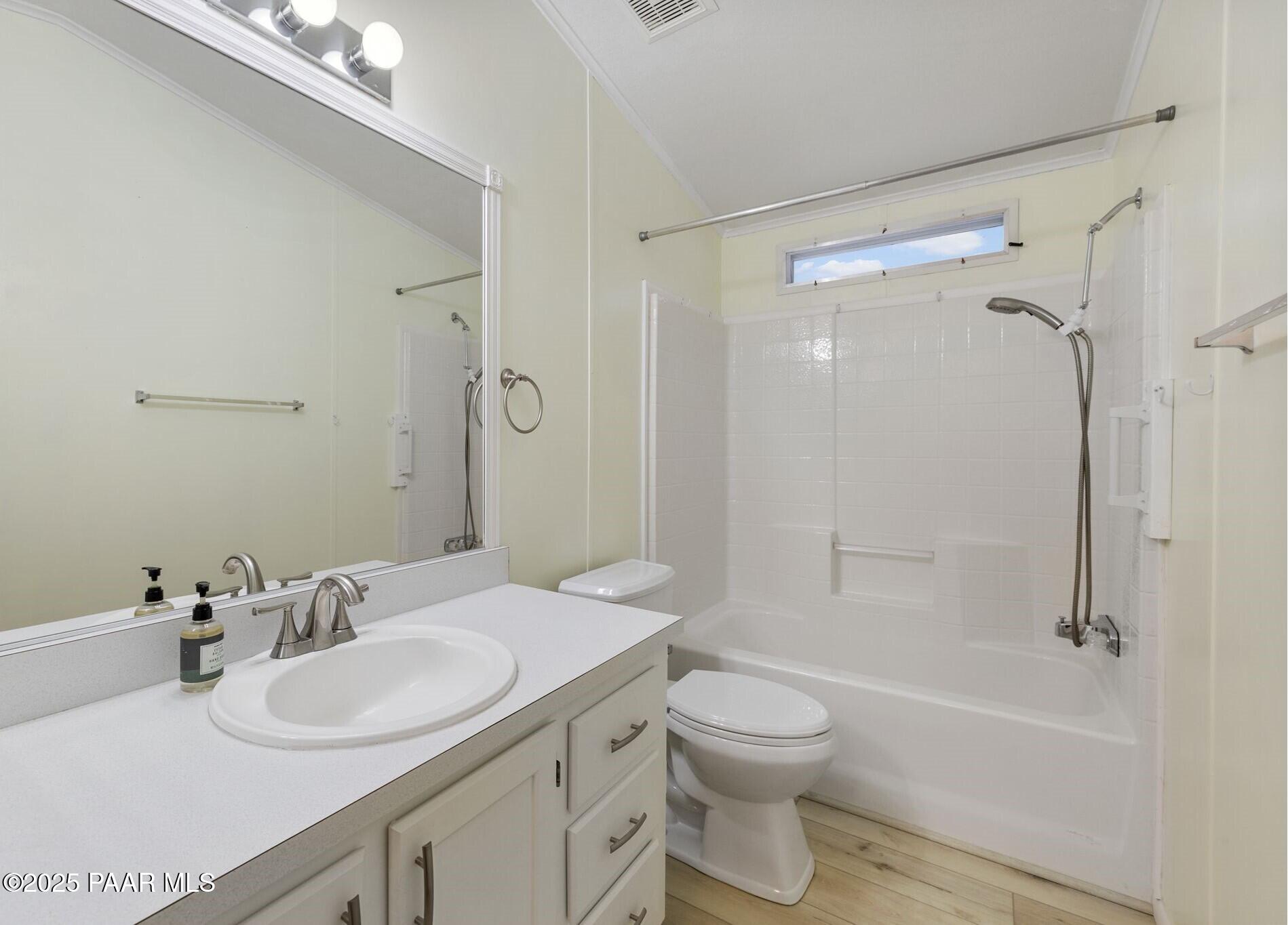 2572 Hilltop Road Prescott, AZ 86301 - Photo 24 of 34 a bathroom with a granite countertop sink toilet and shower