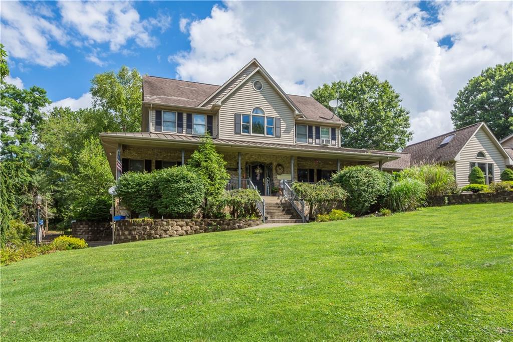 230 Sundust Road Eighty Four, PA 15330 - Photo 1 of 47 a front view of house with yard and green space