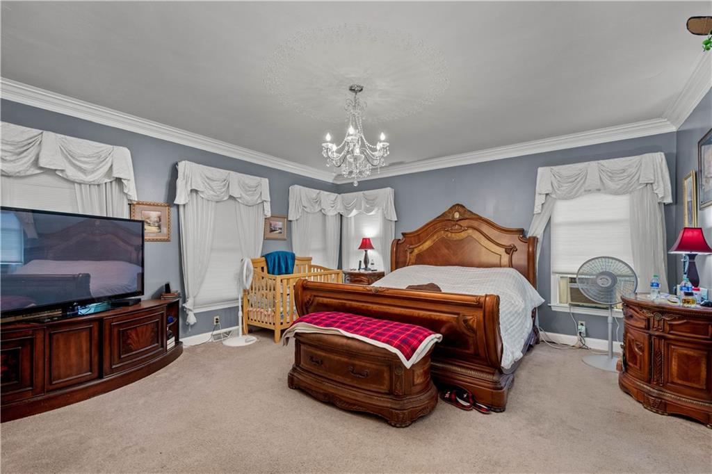 230 Sundust Road Eighty Four, PA 15330 - Photo 15 of 47 a bedroom with furniture and a chandelier