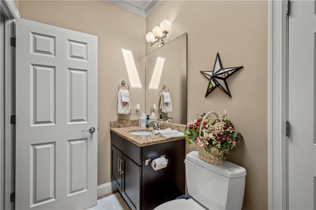 230 Sundust Road Eighty Four, PA 15330 - Photo 40 of 47 a bathroom with a toilet a sink and a mirror
