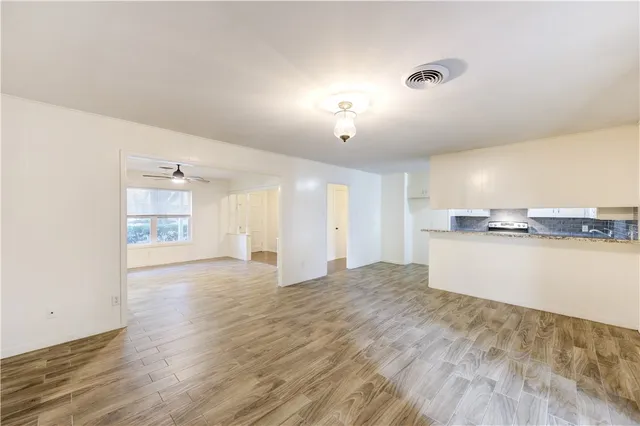 a view of a kitchen with a sink and dishwasher