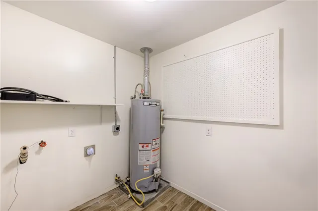 a view of a storage & utility room with washer and dryer