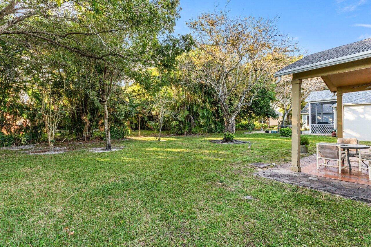 2224 Soundings Court Greenacres, FL 33413 - Photo 29 of 46 a view of a park with large trees