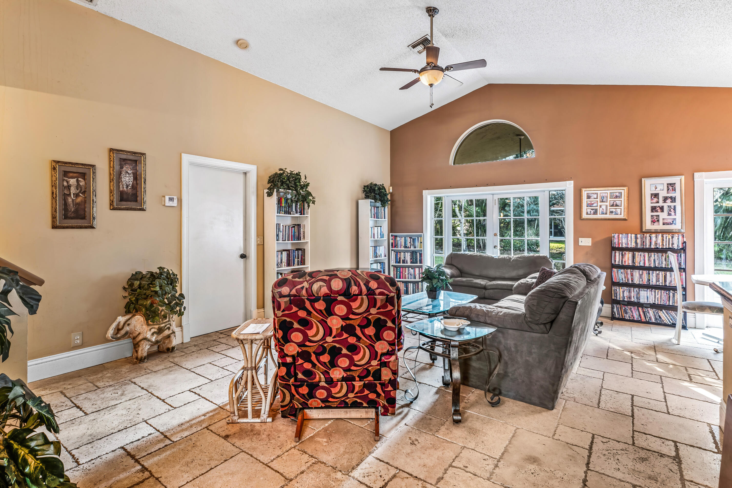 2224 Soundings Court Greenacres, FL 33413 - Photo 7 of 46 a living room with furniture and a large window