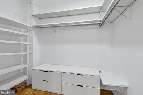 a view of an empty walk in closet