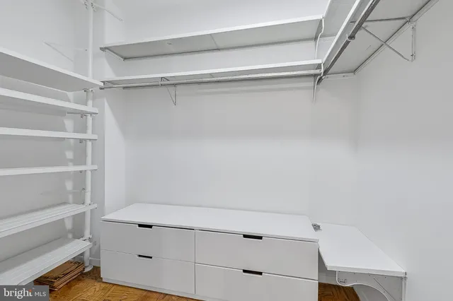 a view of an empty walk in closet