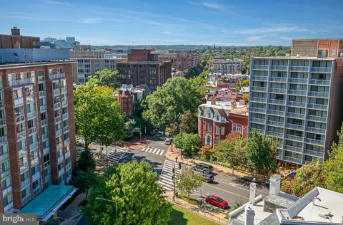 a view of a city and tall buildings