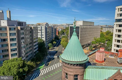 a view of a chairs and table in the patio