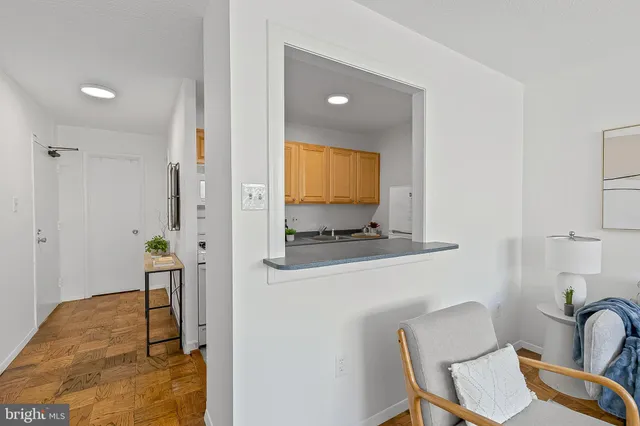 a view of dining room with furniture and wooden floor