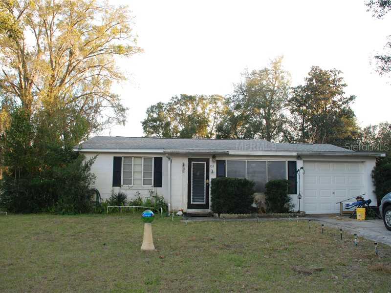 137 Verona Road DeBary, FL 32713 - Photo 1 of 1 a view of a house with backyard and plants
