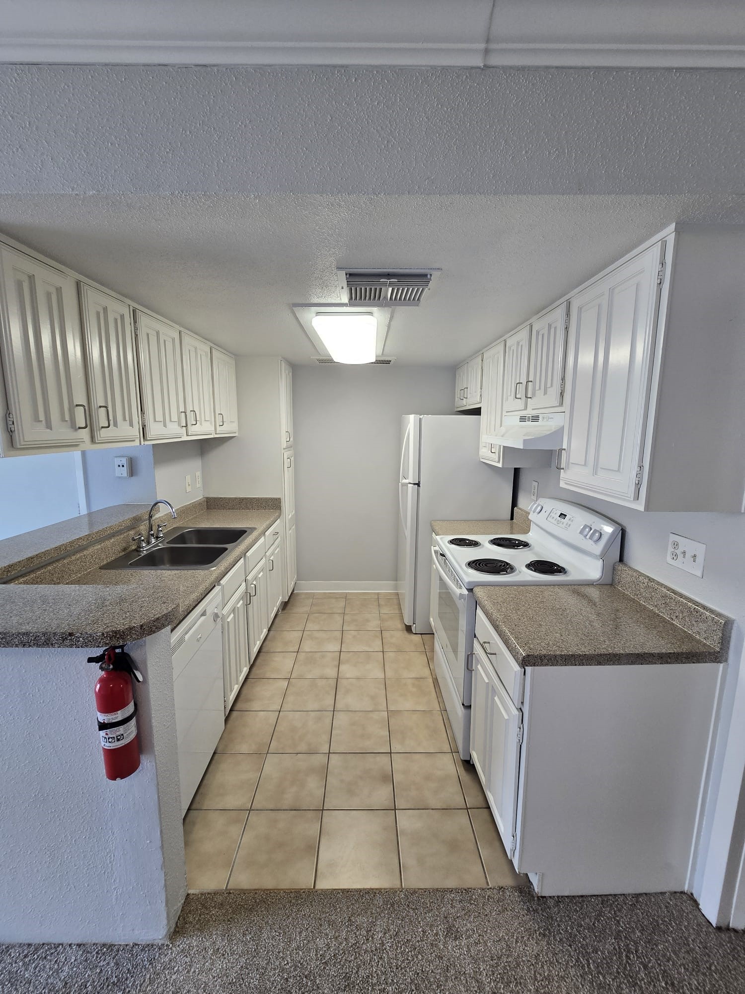 4747 Allendale Road, Unit 50 Houston, TX 77017 - Photo 4 of 9 a kitchen with stainless steel appliances granite countertop a sink stove and cabinets