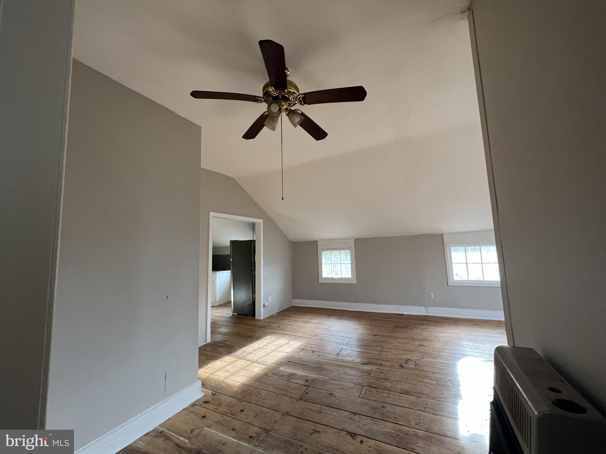 1 Breakneck Road, Unit 6 Medford, NJ 08055 - Photo 11 of 20 a view of empty room with wooden floor and fan