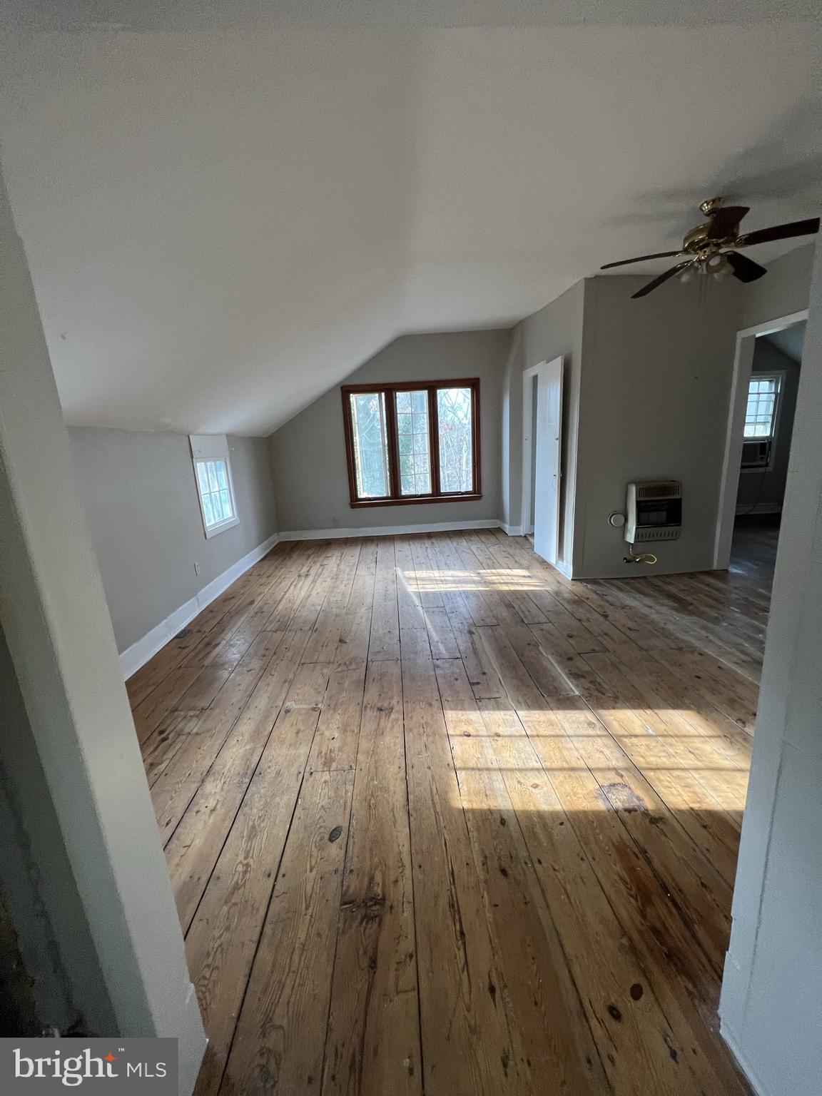 1 Breakneck Road, Unit 6 Medford, NJ 08055 - Photo 7 of 20 a view of empty room with wooden floor and fan