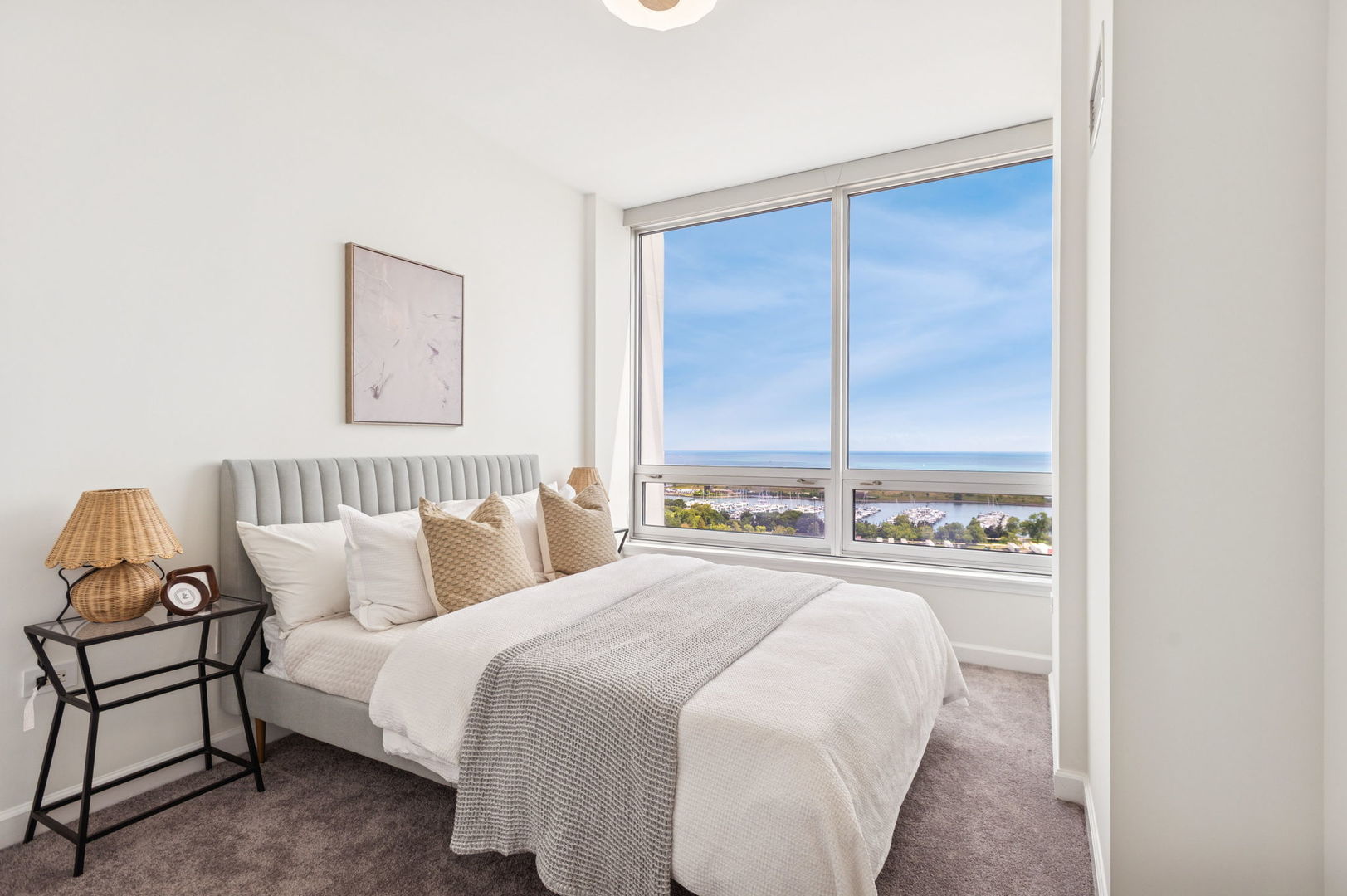 1901 South Calumet Avenue, Unit 1803 Chicago, IL 60616 - Photo 14 of 20 a bedroom with a bed and a window