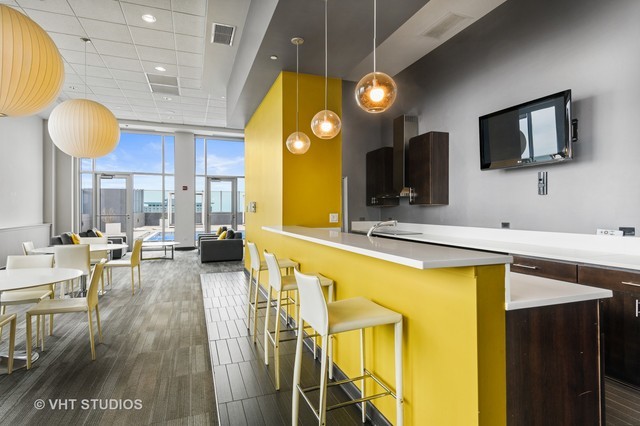 1901 South Calumet Avenue, Unit 1803 Chicago, IL 60616 - Photo 17 of 20 a view of a living room and dining room