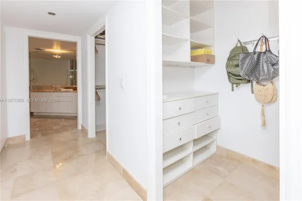 a view of a bedroom and a bathroom
